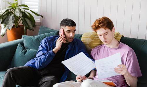 A couple looking at bills