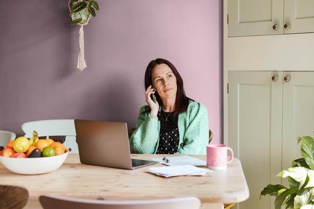 Photo of a woman on the phone