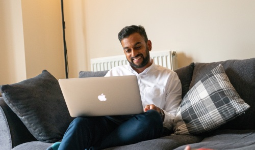 Man sitting on a laptop