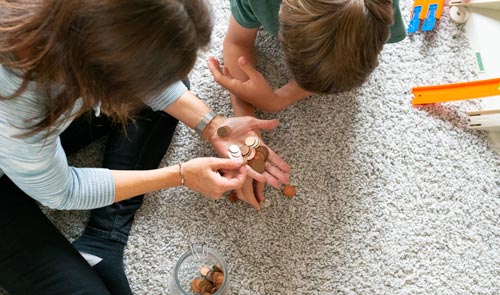 mum and son counting pennies