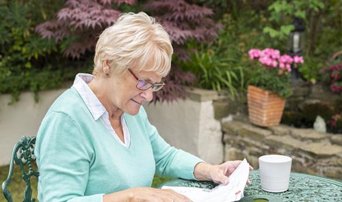 Older lady looking at documents