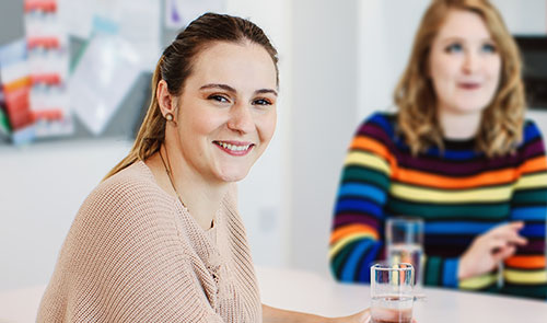 Colleagues in a breakout area