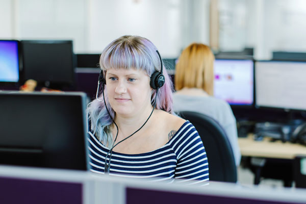 Advisor at her computer