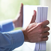 man holding documents