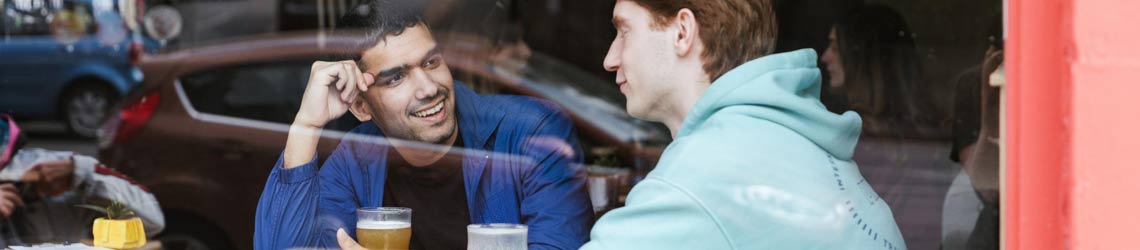 Photo of men talking