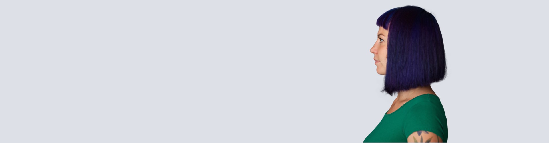 Woman pushing her son on a swing