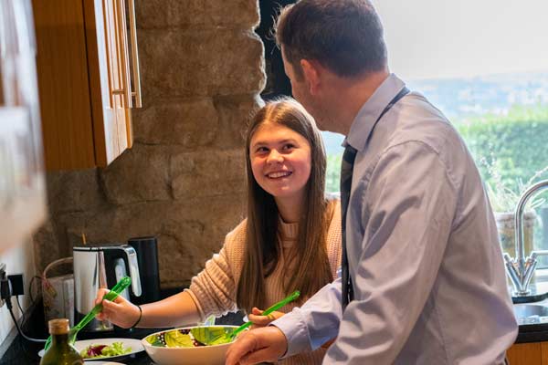 Dad and daughter cooking