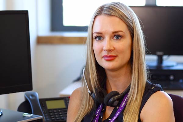 Female advisor talking to the camera