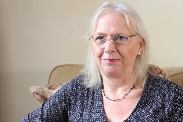 lady at home on her sofa