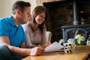 couple at their coffee table